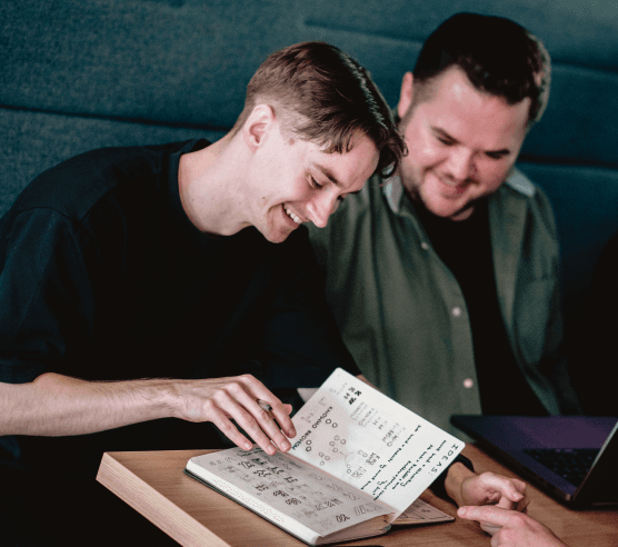 Team reviewing UX notes together